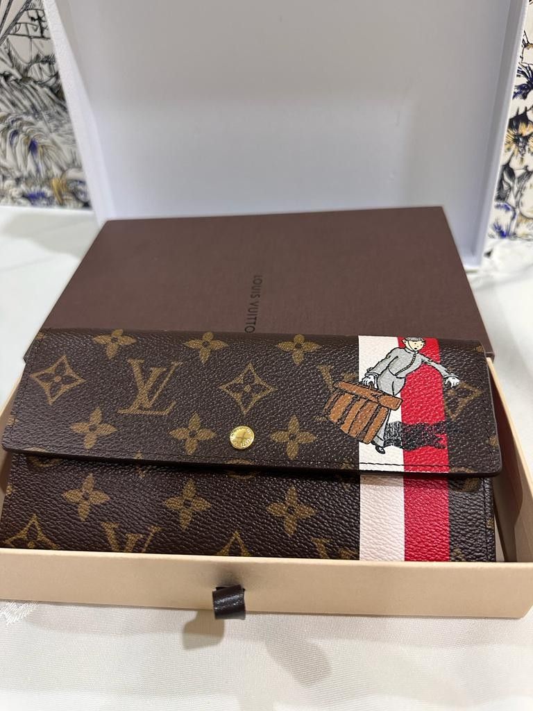 Authentic Louis Vuitton Limited Edition Tin Tin Wallet, Luxury, Bags &  Wallets on Carousell