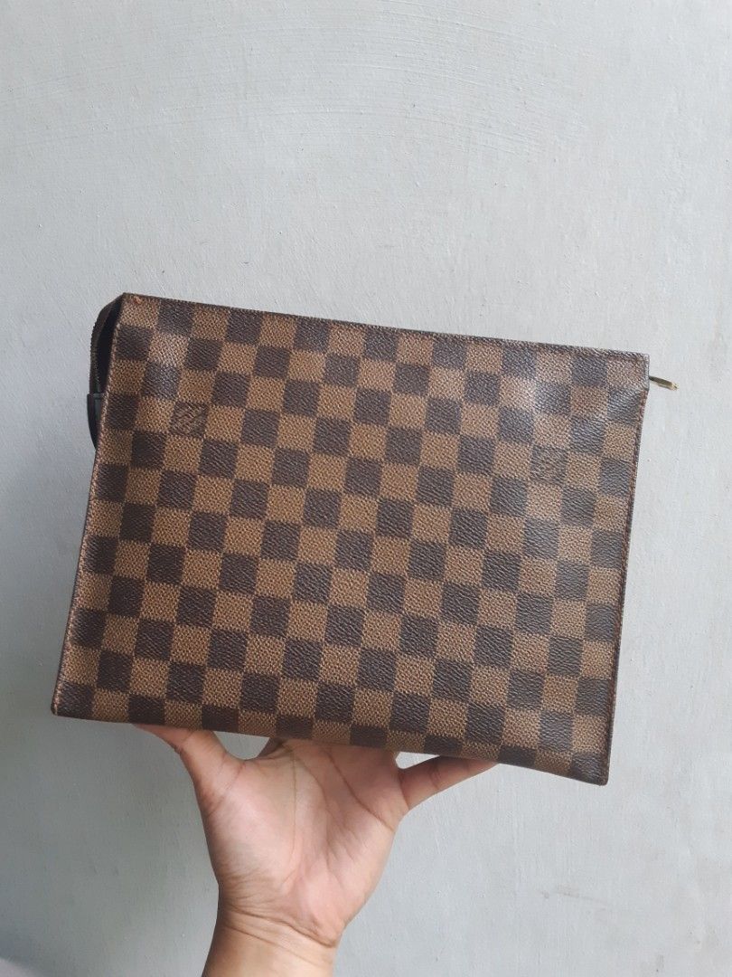 LOUIS VUITTON TOILETRY 26 CLUTCH BAG DAMIER EBENE, Luxury, Bags & Wallets  on Carousell