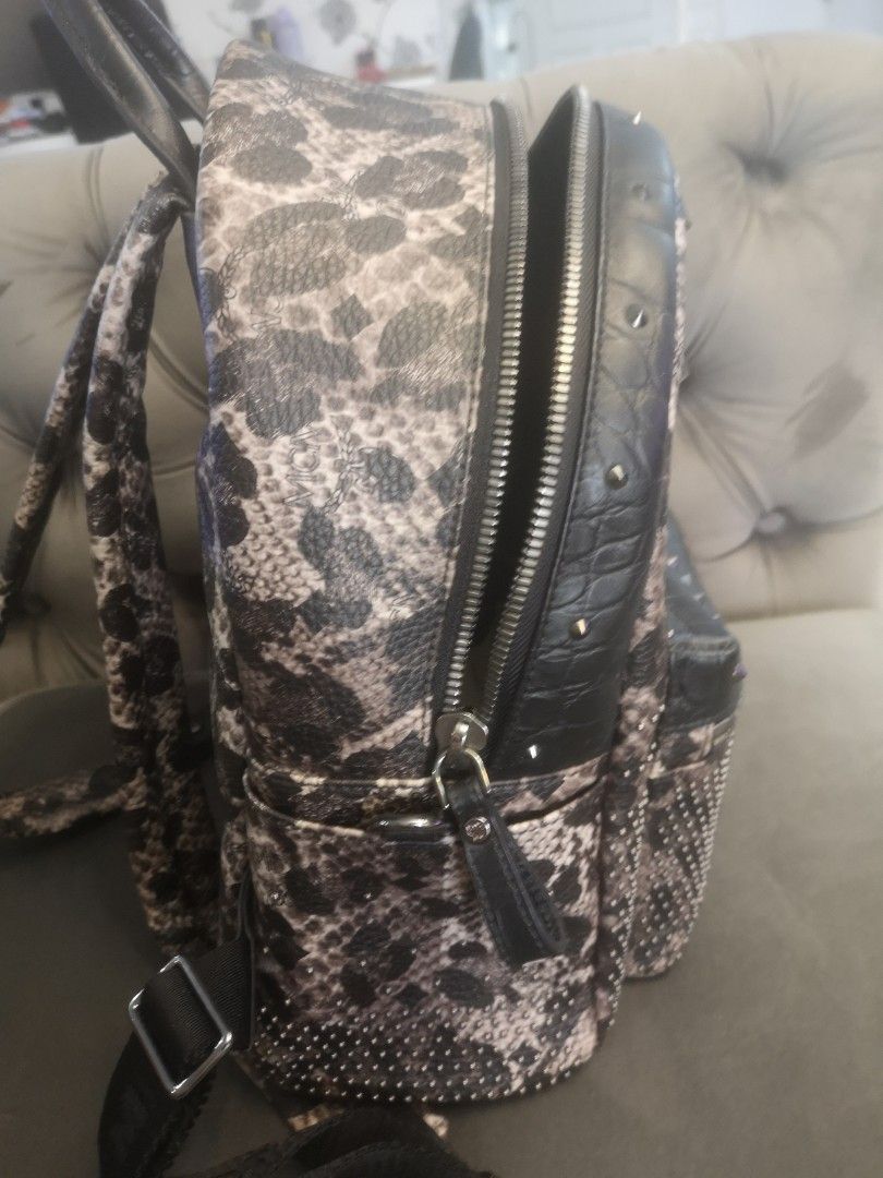 Mcm backpack material sale