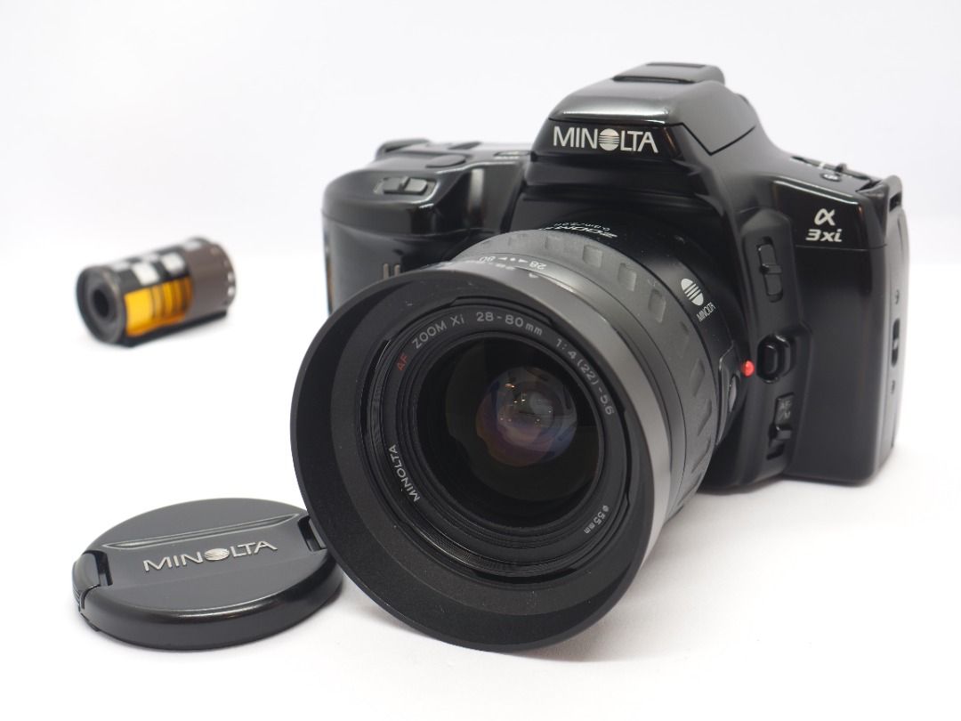 Minolta 3xi Zoom Xi 28-80mm lens 35mm SLR film camera, Photography,  Cameras on Carousell