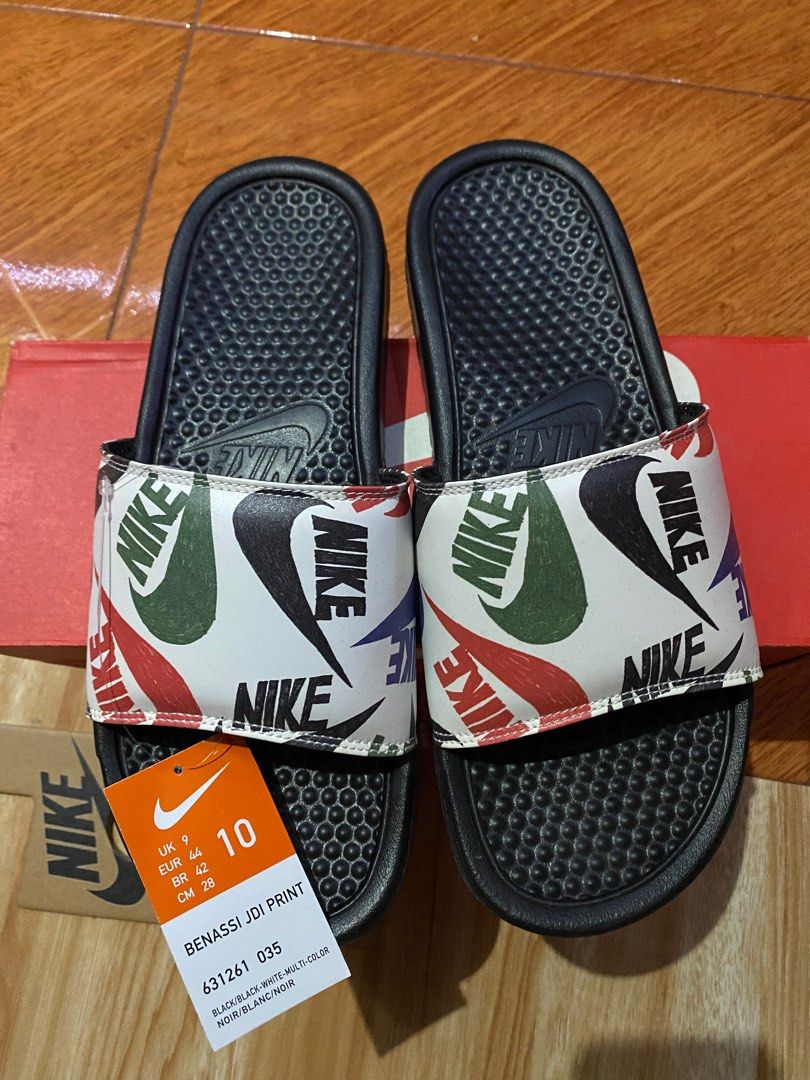 Nike benassi jdi print size 9/10/11 (Category: Slippers & Slides) located in Pasig City. Submitted by melvin_02 (Listing ID 1236197573, Image 3). Description: Available cod via lalamove metromanila.