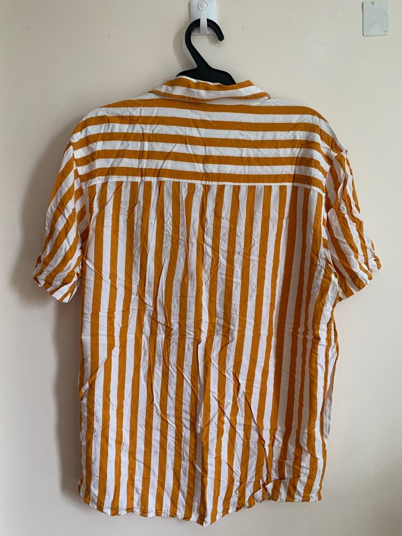 Penshoppe Striped Button up shirt (Category: Tshirts & Polo Shirts ) located in Quezon City. Submitted by caspii (Listing ID 1236103627, Image 2). Description: Penshoppe striped polo shirt -wrinked sa pic pero really nice and soft when ironed!! MOP: Gcash Delivery via grab/lalamove shouldered by buyer.
