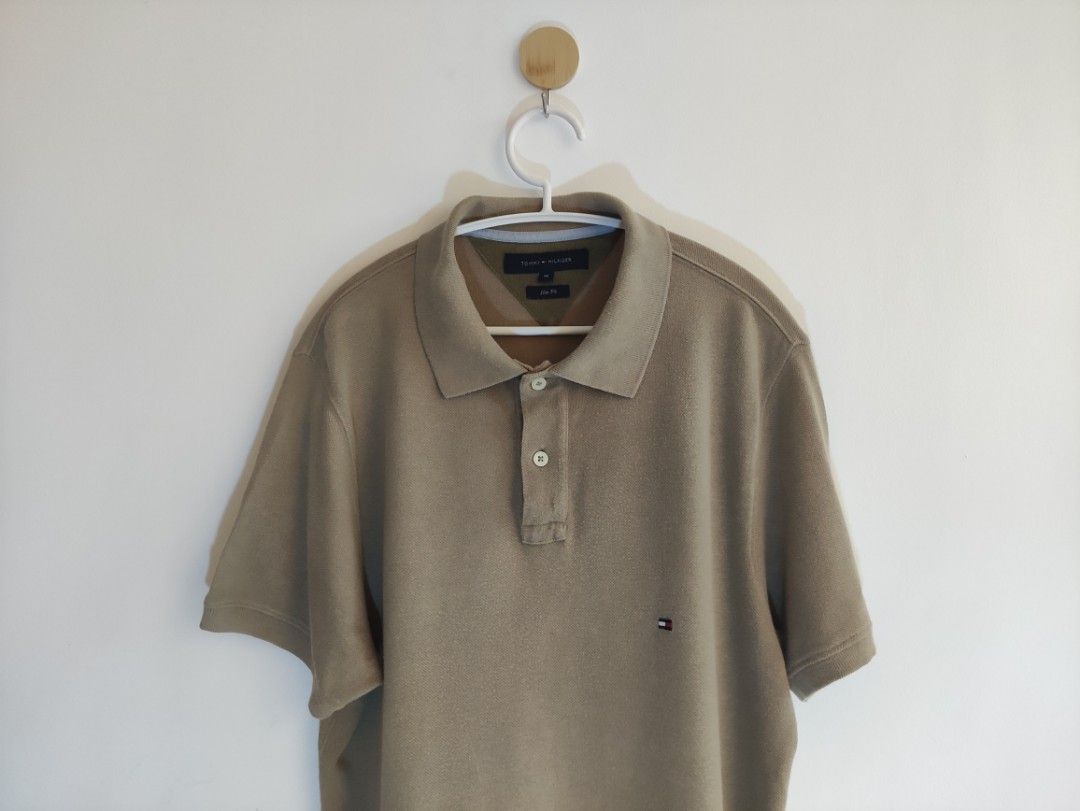 Tommy Hilfiger Polo Shirt (Category: Tshirts & Polo Shirts ) located in Quezon City. Submitted by slram (Listing ID 1236076041, Image 2). Description: 🔵 Tommy Hilfiger Polo Shirt - Size: Medium slim fit - W19/ L28.5 - Color: Mocha - Condition: 9/10 ₱600 plus sf 📸Colour / Image Disclaimer ... Despite every effort to provide accurate images of each product's colour, actual colours may vary slightly, .. 📸 Model & actual photos posted MOP: Gcash, 