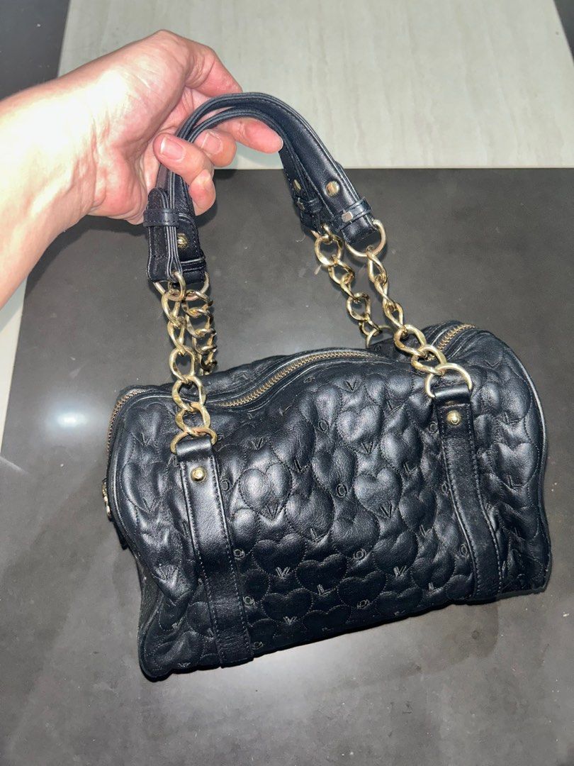 Authentic Lovcat Boston Bag (Category: Luxury Bags & Wallets) located in Bulacan. Submitted by comkay (Listing ID 1236347123, Image 2). Description: Issue: Missing a part of the metal cap as shown on photo. Still a very nice bag.