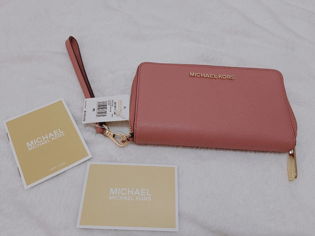 BRANDNEW mk wallet (Category: Luxury Bags & Wallets) located in Manila. Submitted by masterlei (Listing ID 1236284954, Image 1). Description: BRANDNEW with tag guaranteed authentic store bought in US selling below srp 3500 pesos loc manila.
