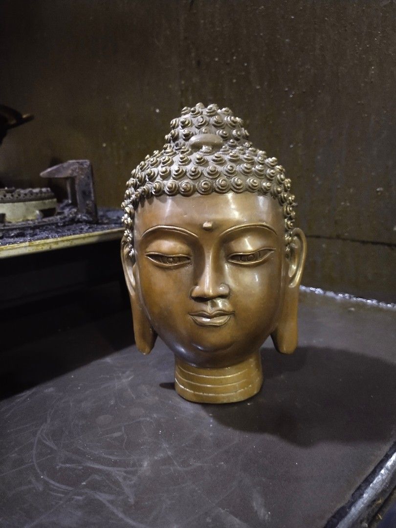 Brass buddha head statue on Carousell
