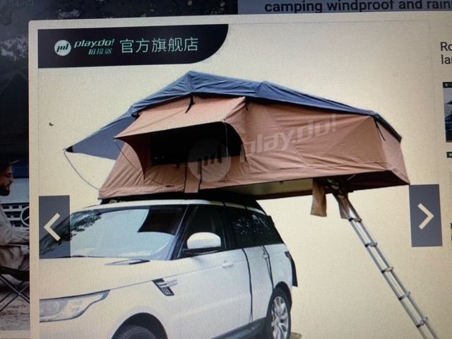 4x4 with tent on shop roof