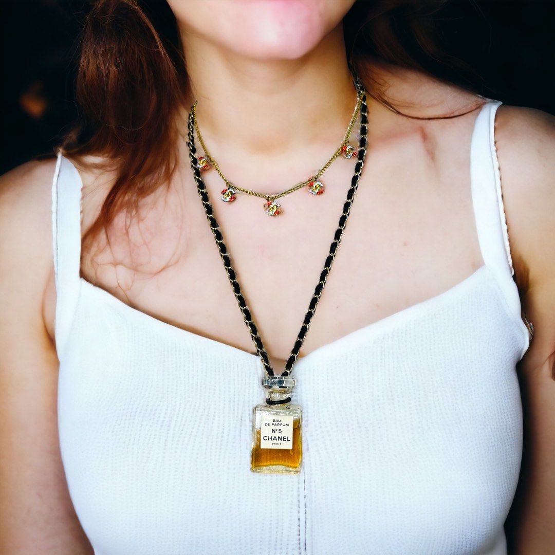 Chanel perfume necklace pendant n5 golden Metal ref511077  Joli Closet