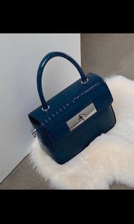 Cute mini blue croc effect bag