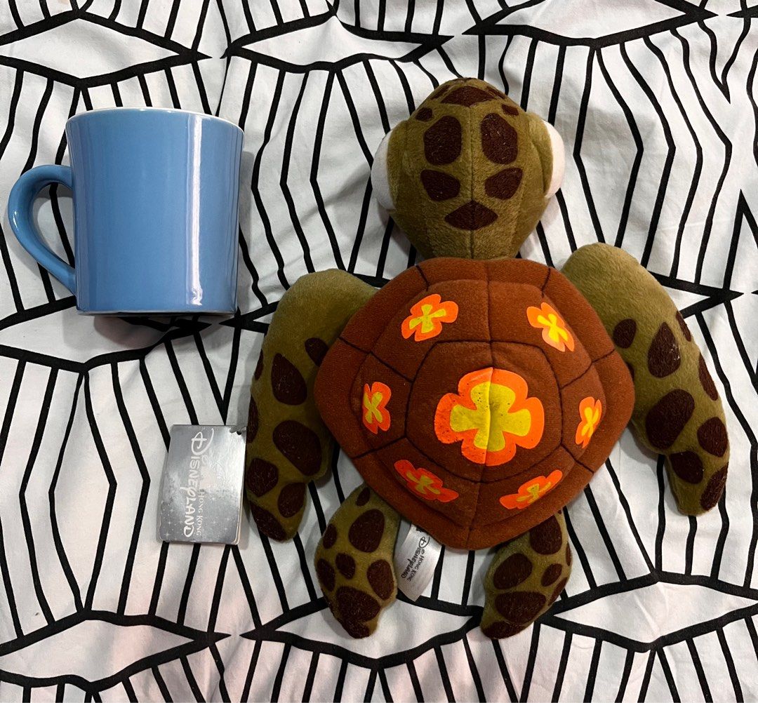 Finding Nemo Squirt turtle (Category: Figurines & Statues) located in Quezon City. Submitted by junkstar2020 (Listing ID 1236270831, Image 3). Description: Original Disneyland toy. Length: 9 inches Shell width: 6 inches. Mug for scale not included..