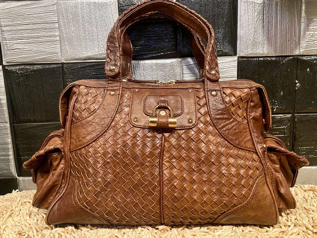 Totally leather handbag Louis Vuitton Brown in Leather - 35595817