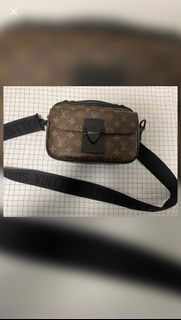 Louis Vuitton S LOCK SLING BAG, Luxury, Bags & Wallets on Carousell