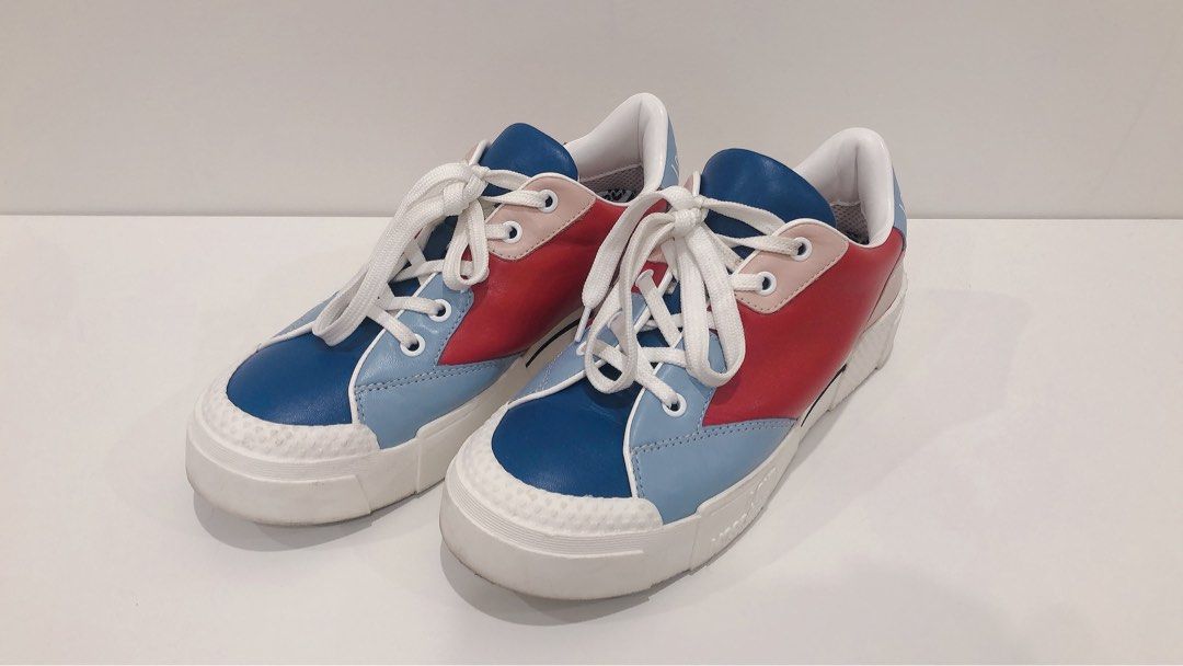 Love Moschino Colour-Block Panelled Leather Sneakers size 39 (Category: Women's Shoes) located in Miranda. Submitted by abbie.corner (Listing ID 1236379090, Image 1). Description: Highlights multicolour leather colour-block design RRP $479 Heel 5 cm Sole height 2.5 cm -round toe -front lace-up fastening branded insole flat rubber sole Composition Outer: Leather 100% Sole: Rubber 100% Lining: Fabric 100% Pick up Kirrawee or postage available.