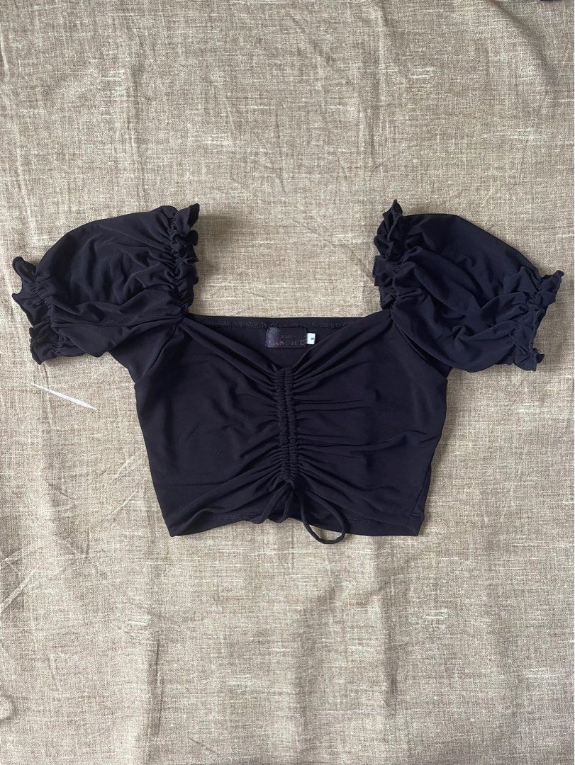 Puff sleeve crop top (Category: Blouses) located in Dasmarinas. Submitted by k_decluttering (Listing ID 1236300612, Image 1). Description: Used once. Rfs: delcuttering Loc: Dasma, Cavite.