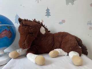 Sitting horse stuffed toy