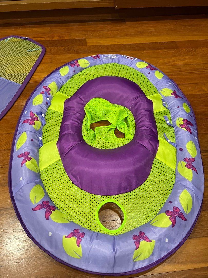Swim float (Category: Infant Playtime) located in Singapore. Submitted by shasey (Listing ID 1236367321, Image 2). Description: - good for toddlers between age 1 to 3 - Safe to support a toddler in water. - toddler can play bath toys in the netted area with water - There’s a detachable shade to shelter from the sun.