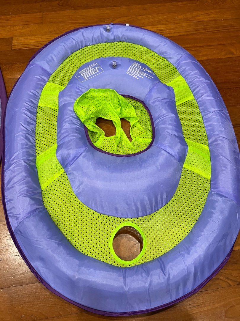 Swim float (Category: Infant Playtime) located in Singapore. Submitted by shasey (Listing ID 1236367321, Image 3). Description: - good for toddlers between age 1 to 3 - Safe to support a toddler in water. - toddler can play bath toys in the netted area with water - There’s a detachable shade to shelter from the sun.