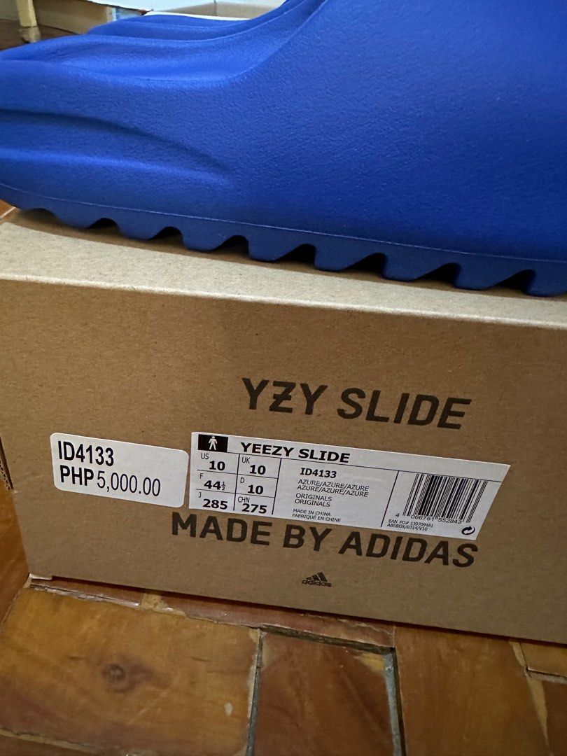 Yeezy slide azure, Men's Fashion, Footwear, Slippers & Slides on Carousell