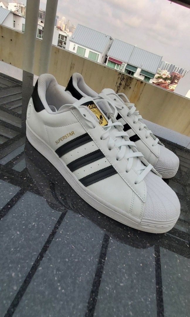 Adidas originals superstar store white & black sneakers