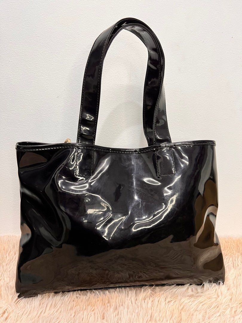 Authentic See by Chloe tote bag (Category: Luxury Bags & Wallets) located in Cagayan de Oro. Submitted by riggstuffs (Listing ID 1236548021, Image 2). Description: Guaranteed Authentic See by Chloe Tote Bag With code Patent leather material Spacious interior Silver tone hardwares Disclaimer: Riggstuffs is not affiliated or associated with the brand posted. All copyright and trademark belong solely to the original brand owner..