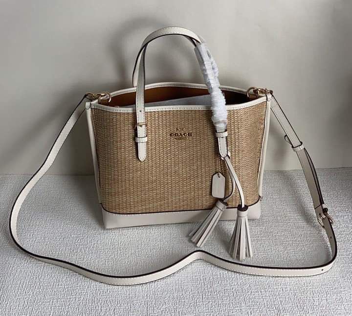 Coach Mollie Tote Bag (Category: Luxury Bags & Wallets) located in Rizal. Submitted by LuxbyMarifrance (Listing ID 1236519421, Image 2). Description: 🏷️ 2,600 only + SF 💼 COACH MOLLIE TOTE 25 IN STRAW 📏 9 3/4” (L) x 7 1/2” (H) x 4 3/4” (W) 📌 with dust bag and paper bag ✨All trademarks, logos and brand names are reserved and property of the original brand owners. #coachph #authenticqualitybagsph #authenticqualitybags #lowestpriceguaranteed #co