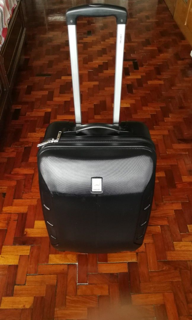 Delsey Preference Enigma Luggage (Category: Luggage) located in San Juan City. Submitted by onlinecabinet (Listing ID 1236524420, Image 2). Description: [FOR SALE: PLEASE READ] ORIGINAL & AUTHENTIC Delsey Preference Enigma Luggage Color: Black/Noir (Textured - looks like Carbon Fiber Design) VERY AESTHETIC Size: Bigger than hand-carry but slightly smaller than medium size luggage External body dimensions: 15L x 11W x 22H (measurement of outer she
