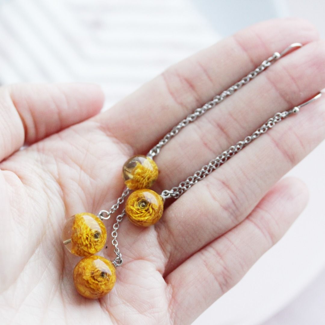 Earrings with flowers inside discount