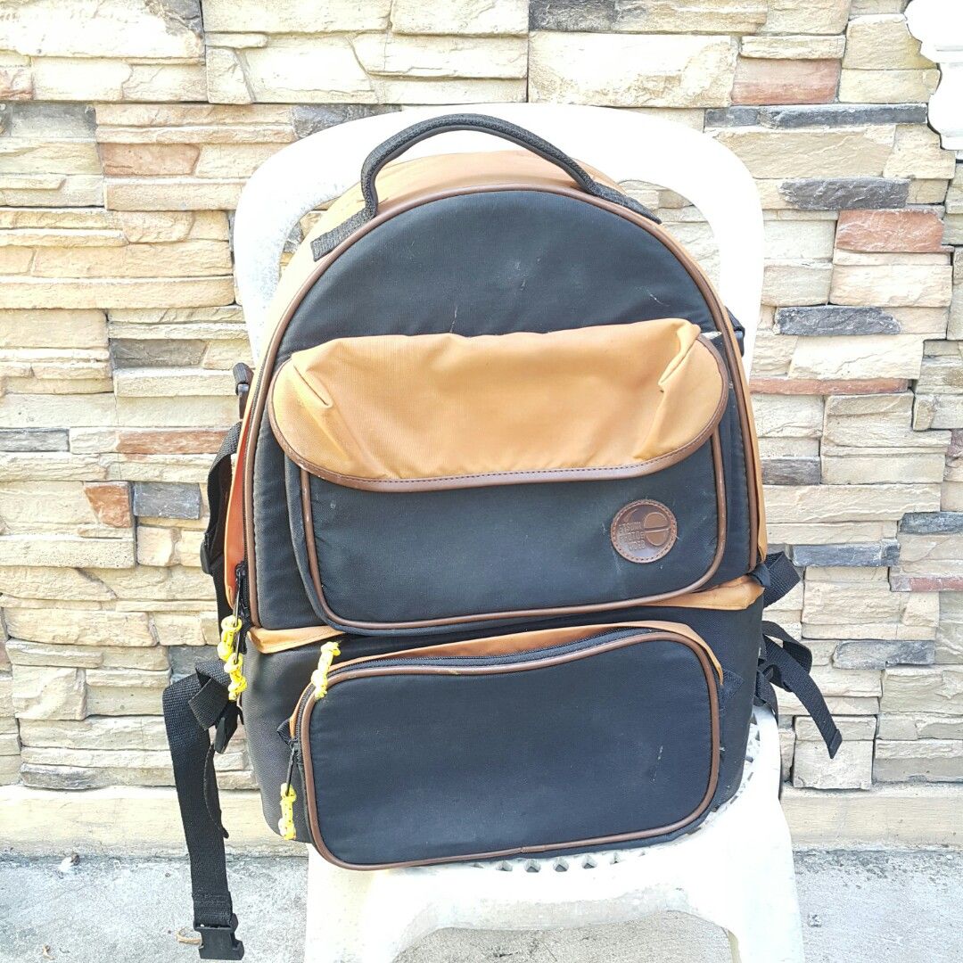 Etsumi Large Camera Bag Backpack (Category: Backpacks) located in Paranaque City. Submitted by vintagepopsicle (Listing ID 1236469982, Image 1). Description: Solid Camera Bag with Zipper Issue on top and middle. Each zipper has a pair of pulls and can be closed by one pull but not by its pair. A repair would make this an excellent "Shooting Job" bag worth 3K and up because it can accomodate a lot of items and the Body is still Solidly built. You 