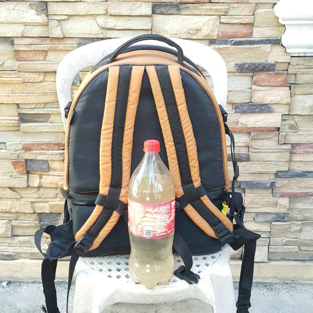 Etsumi Large Camera Bag Backpack (Category: Backpacks) located in Paranaque City. Submitted by vintagepopsicle (Listing ID 1236469982, Image 2). Description: Solid Camera Bag with Zipper Issue on top and middle. Each zipper has a pair of pulls and can be closed by one pull but not by its pair. A repair would make this an excellent "Shooting Job" bag worth 3K and up because it can accomodate a lot of items and the Body is still Solidly built. You 