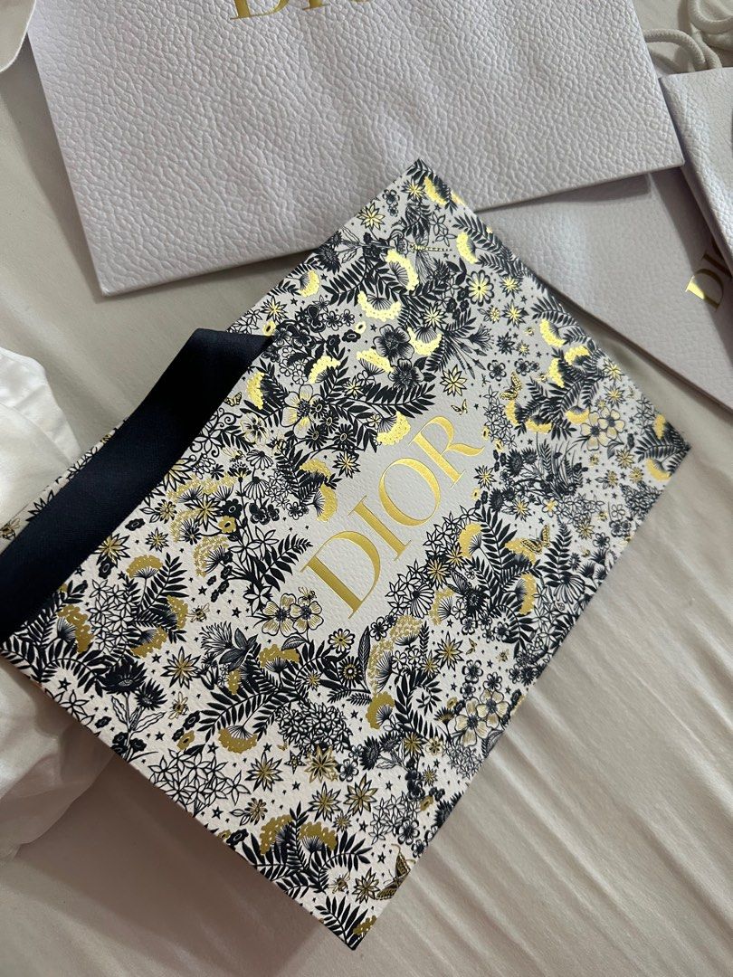 [FREE SHIP MM] Dior Paper Bag Bundle (Category: Luxury Accessories) located in Quezon City. Submitted by glitchandglamor (Listing ID 1236456209, Image 3). Description: • take all, 6 pieces as photographed from dior makeup purchases • priced individually: P250 small plus shipping (3 pcs available) P350 medium plus shipping (1 pc available) P450 large (2 pcs available).