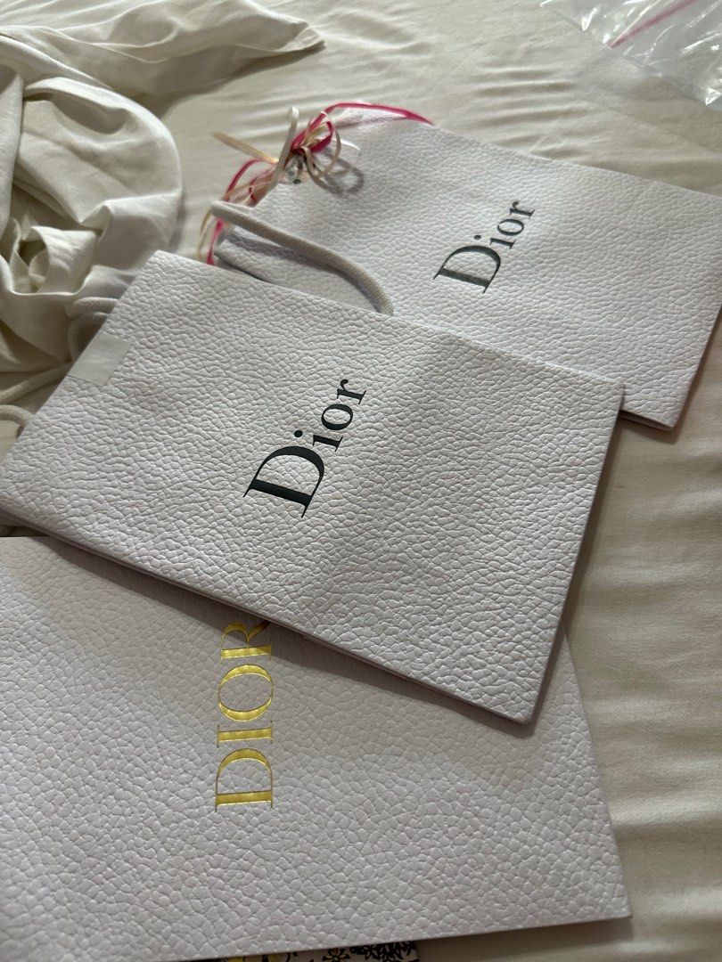 [FREE SHIP MM] Dior Paper Bag Bundle (Category: Luxury Accessories) located in Quezon City. Submitted by glitchandglamor (Listing ID 1236456209, Image 2). Description: • take all, 6 pieces as photographed from dior makeup purchases • priced individually: P250 small plus shipping (3 pcs available) P350 medium plus shipping (1 pc available) P450 large (2 pcs available).