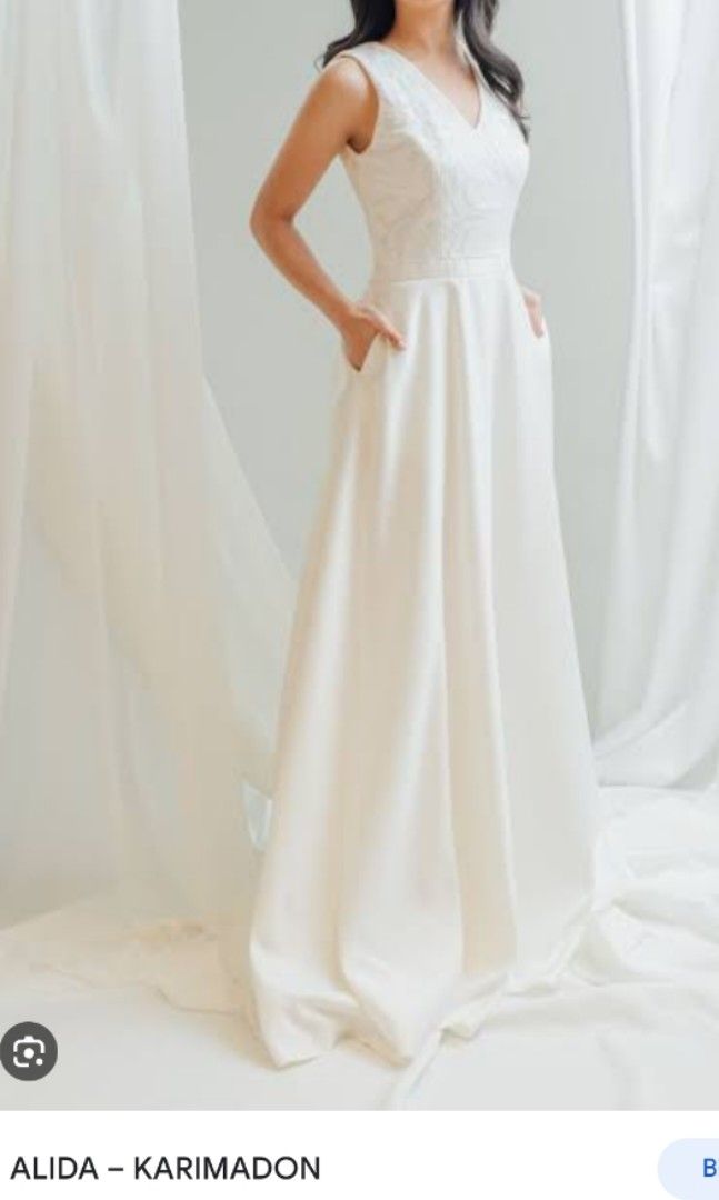 Karimadon White Gown (Category: Evening dresses & gowns) located in Manila. Submitted by declutteringpurpose (Listing ID 1236464337, Image 1). Description: Karimadon White Gown with customized sleeveless - Shipping shoulder by the buyer - Shipping on Mondays or Tuesdays only - price still negotiable.