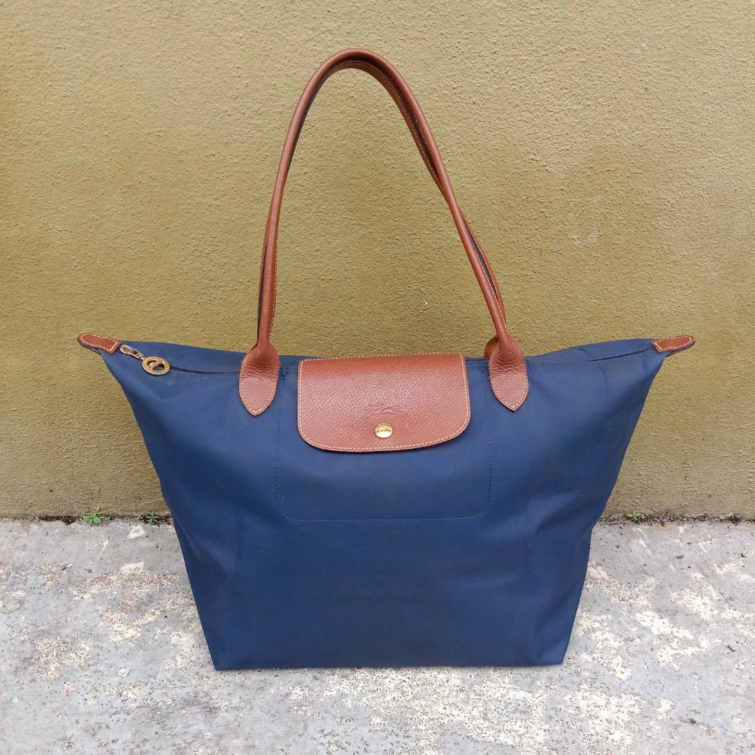 Longchamp Pouch with Handle Le Pliage, Luxury, Bags & Wallets on Carousell
