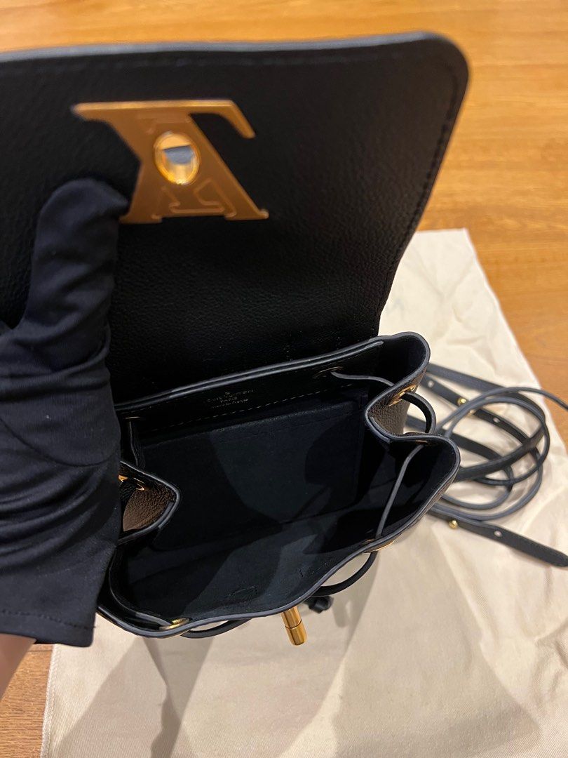 Louis Vuitton Lockme Mini Bagpack, Luxury, Bags & Wallets on Carousell