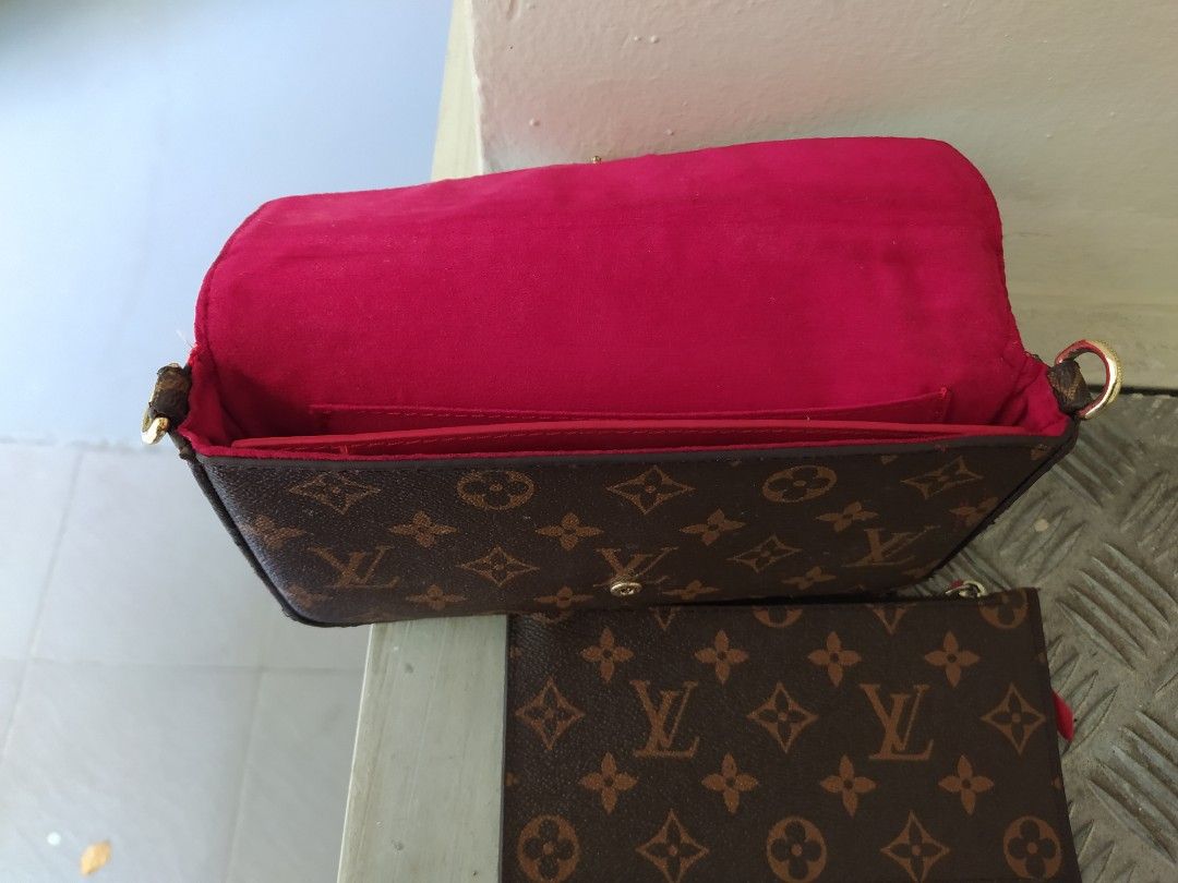 lv bag with red inside