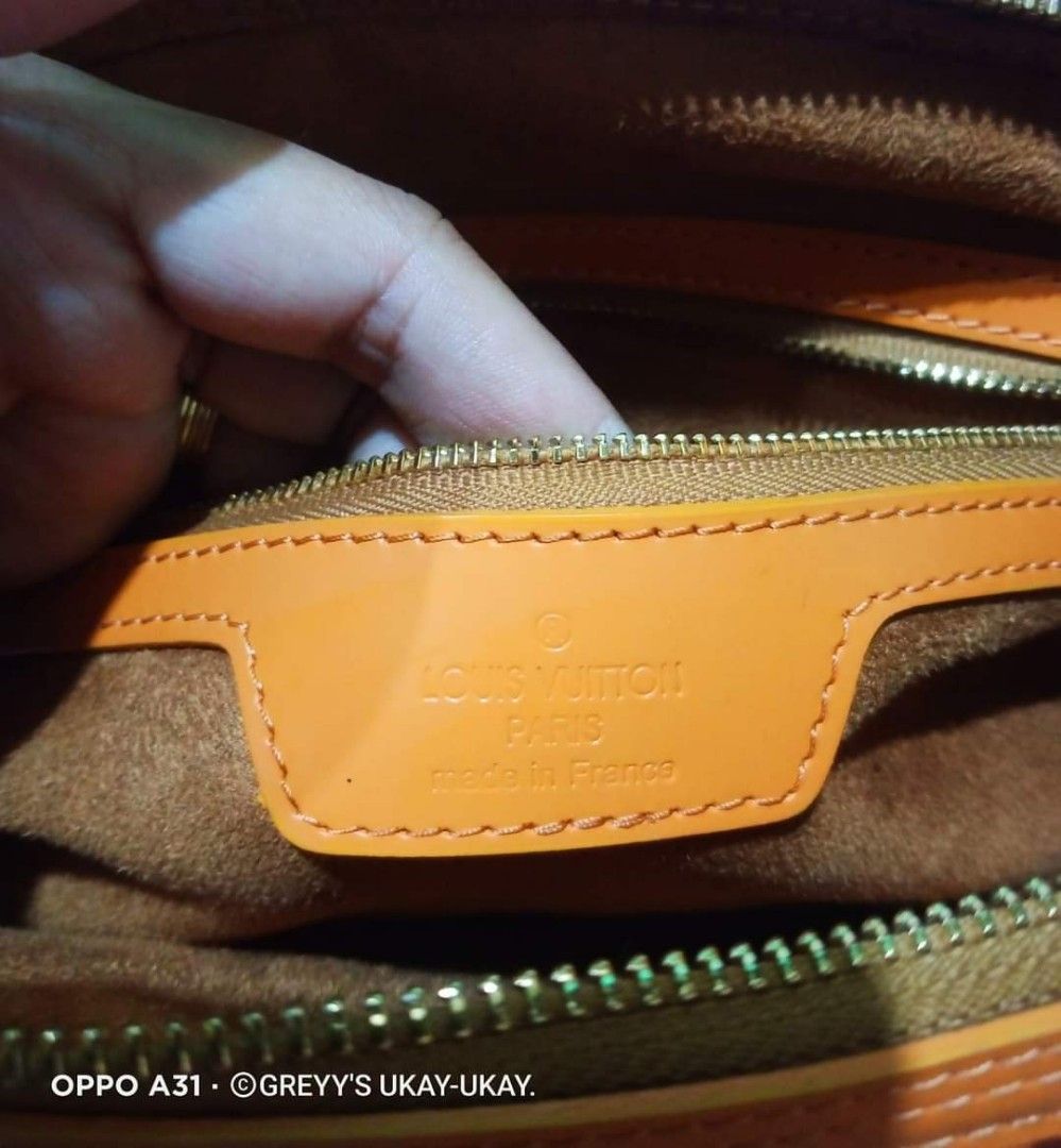 Louis Vuitton Epi Leather Sac Plat in orange, Luxury, Bags & Wallets on  Carousell