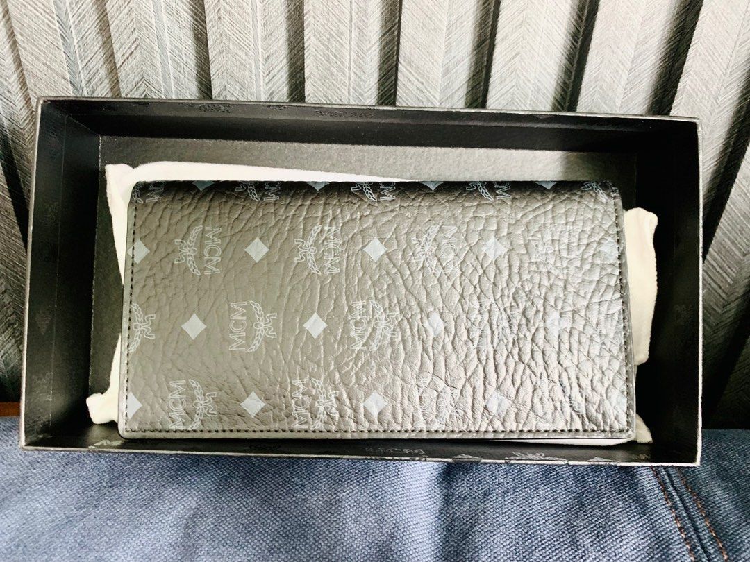 MCM long wallet (Category: Bags & Wallets) located in Singapore. Submitted by checkout768 (Listing ID 1236482616, Image 1). Description: Like new. Great condition! Kept well. .