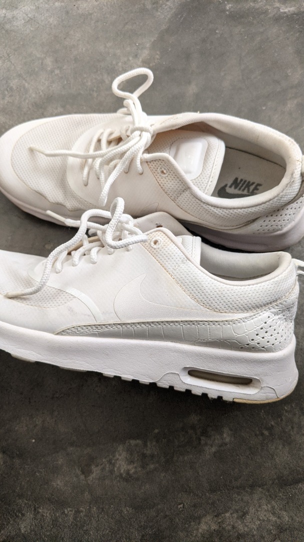 Nike thea 2025 triple white