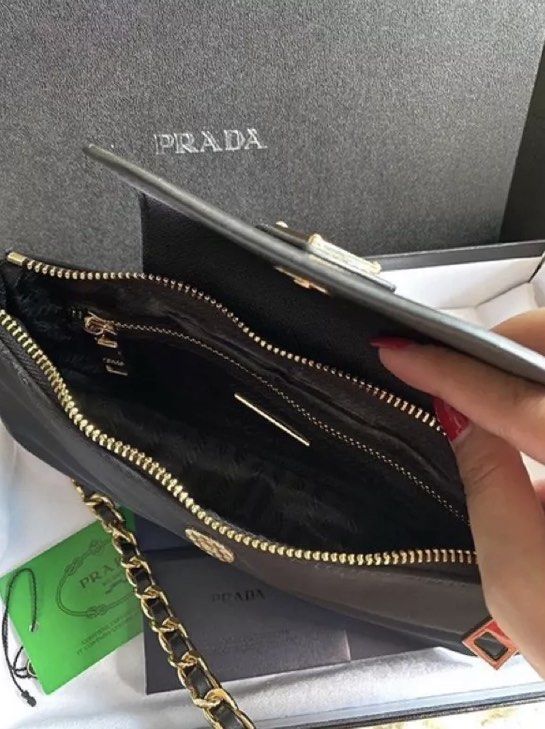 Prada crossbody chain bag (Category: Luxury Bags & Wallets) located in Angeles City. Submitted by lux.finds (Listing ID 1236422855, Image 3). Description: Diclaimer: we are not affiliated with the brand stated in this post, no infringement intended. All copyrights are reserved to its brandowners ..