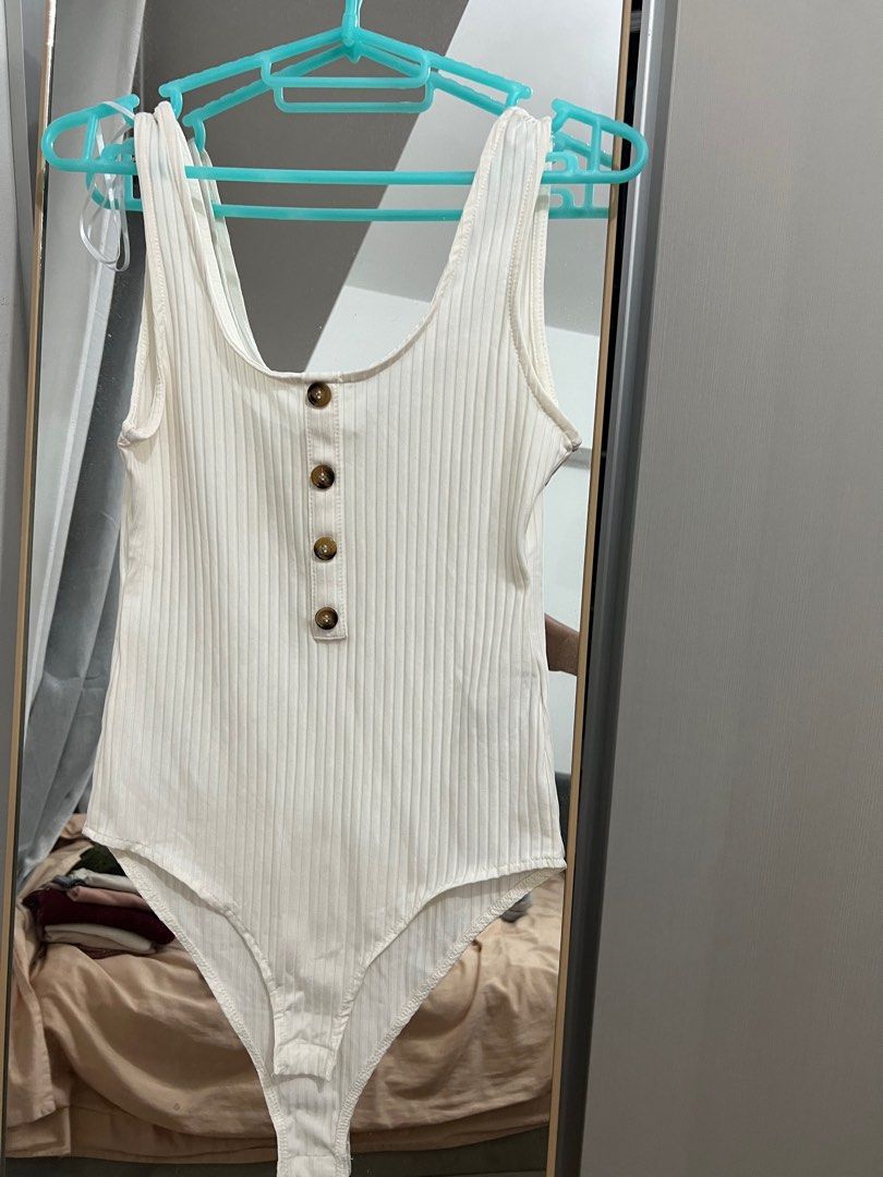 (Preloved) H&M semi white bodysuit size small (Category: Others Tops) located in Davao. Submitted by Eclips33 (Listing ID 1236534455, Image 1). Description: Used only once! Very good condition.