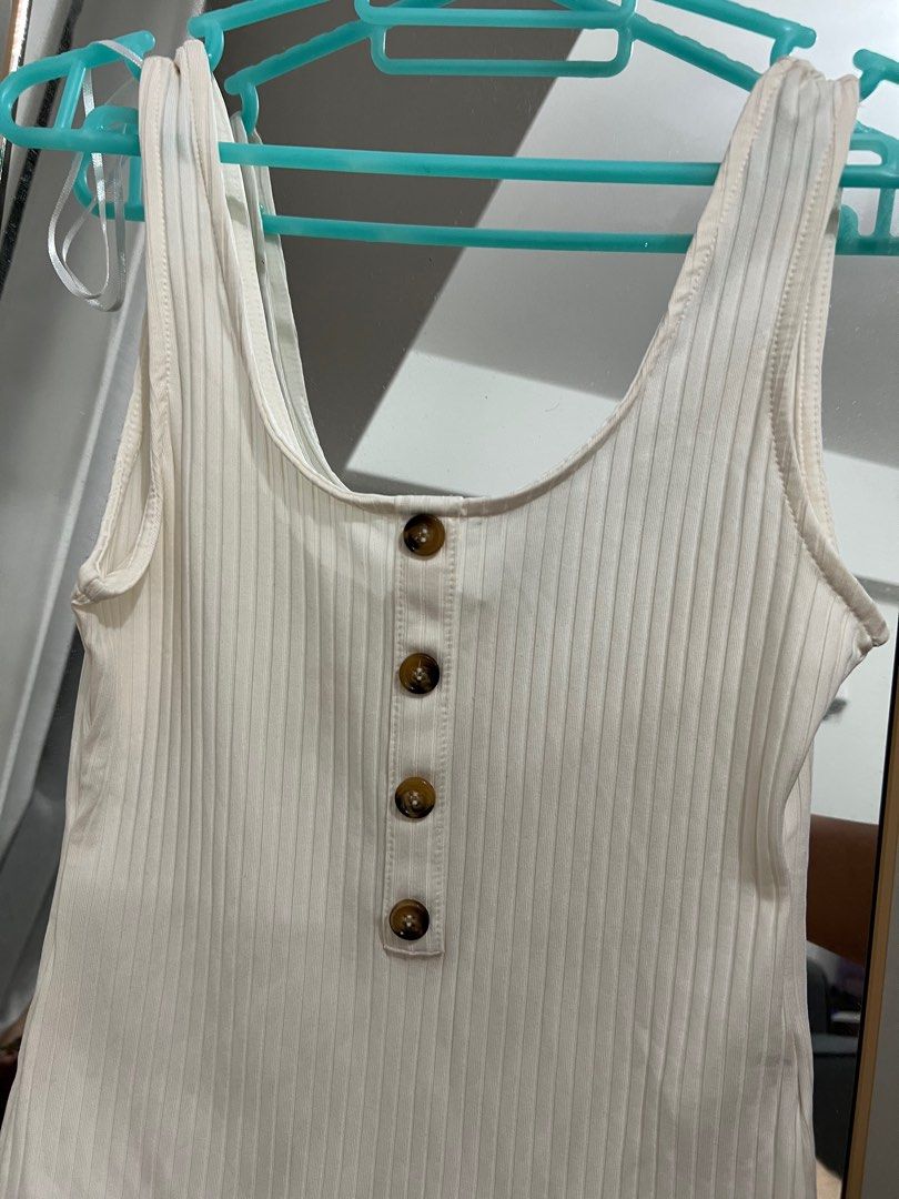 (Preloved) H&M semi white bodysuit size small (Category: Others Tops) located in Davao. Submitted by Eclips33 (Listing ID 1236534455, Image 2). Description: Used only once! Very good condition.
