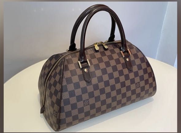 Sale LV Ribera (Category: Luxury Bags & Wallets) located in Paranaque City. Submitted by ms_a_bags (Listing ID 1236445500, Image 1). Description: Sale Original LV Ribera Mm flaws- mini cracks near zipper area and stains inside.
