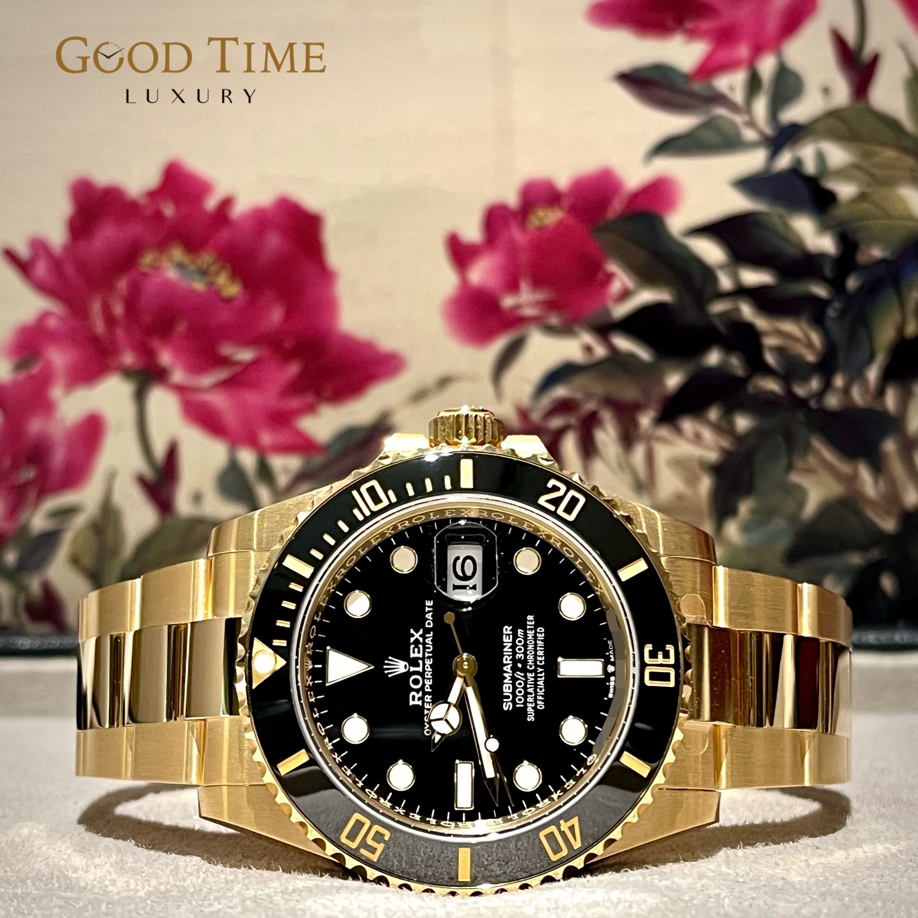 Gold black face rolex top