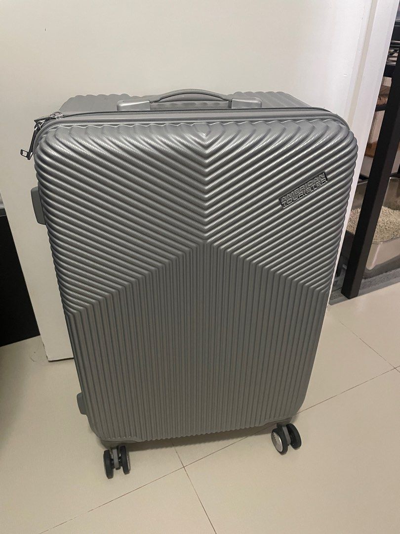 American tourister air shop ride spinner