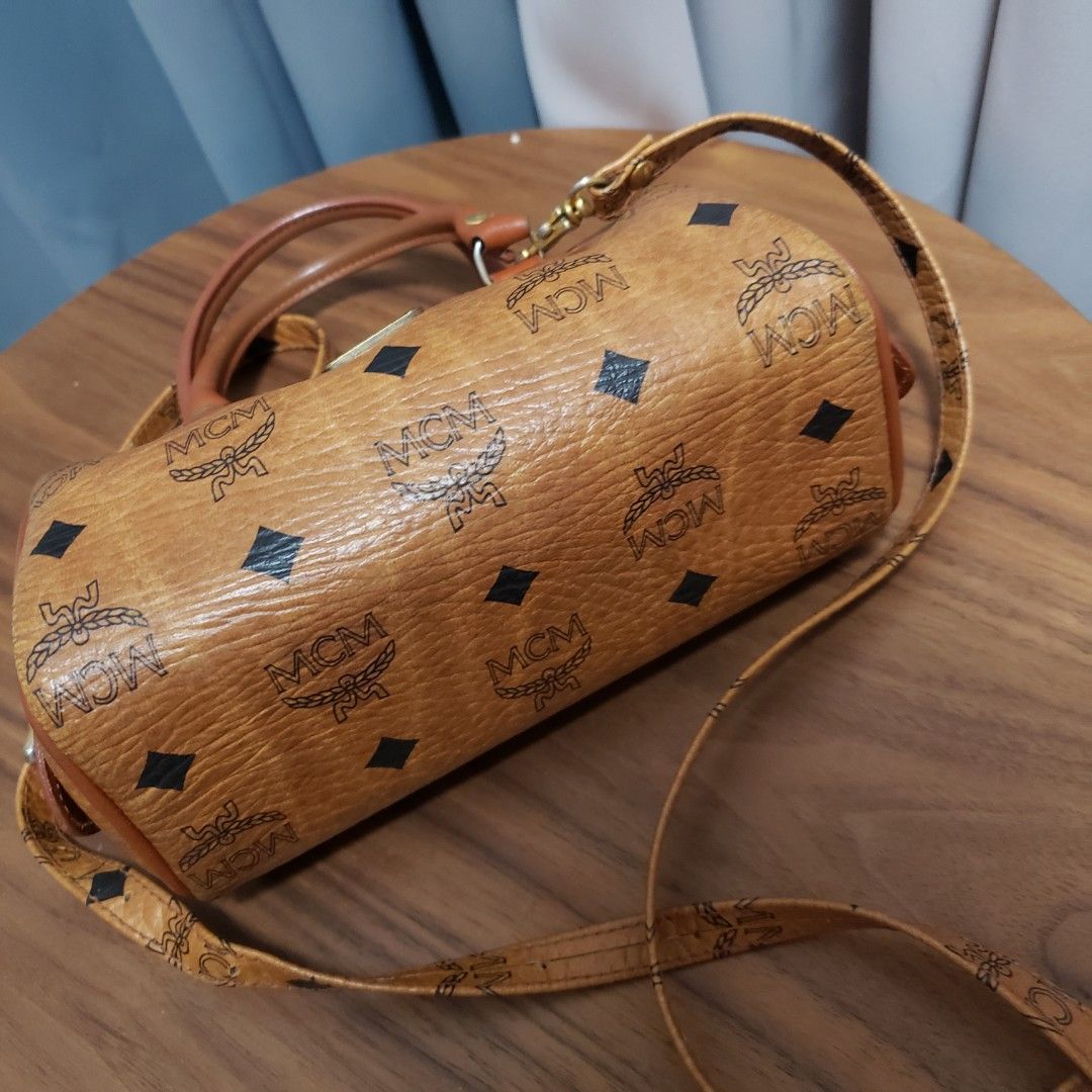 Authentic MCM Cognac Mini Boston Sling Bag (Category: Luxury Bags & Wallets) located in Manila. Submitted by bunny.bella (Listing ID 1240583692, Image 3). Description: Excellent used condition Made in Germany 18cm From Japan.
