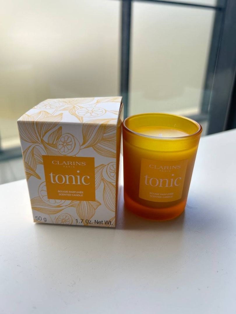 Brand New Clarins Tonic Scented Candle 1.7 oz 50g (Category: Home Decor) located in Melbourne. Submitted by naughtypandaz (Listing ID 1240439985, Image 1). Description: Brand New Clarins Tonic Scented Candle 1.7 oz 50g Pickup @ 3003 (1 block away from free tram zone) Postage +$15 tracking with signature.