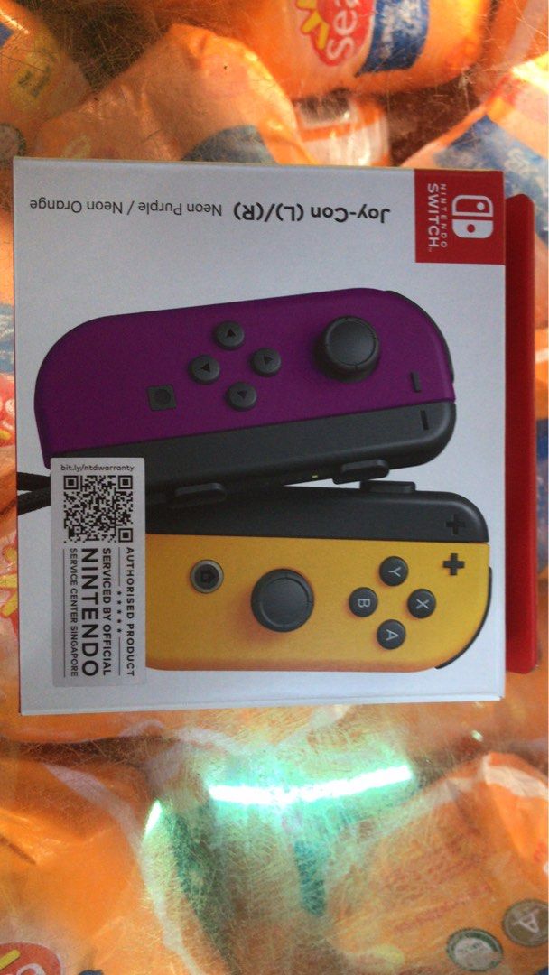 Brand new switch joycon purple/orange, Video Gaming, Video Game