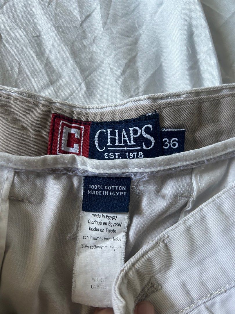 Chaps Classic Chino Shorts (Category: Shorts) located in Pasig City. Submitted by vintagestylemnl (Listing ID 1240456583, Image 1). Description: 📌Khaki Color 📌YKK zip 📌Zipper works well 📌2 pockets at the back 📌Tagged as size 36 but can fit up to 34 per tape measure.