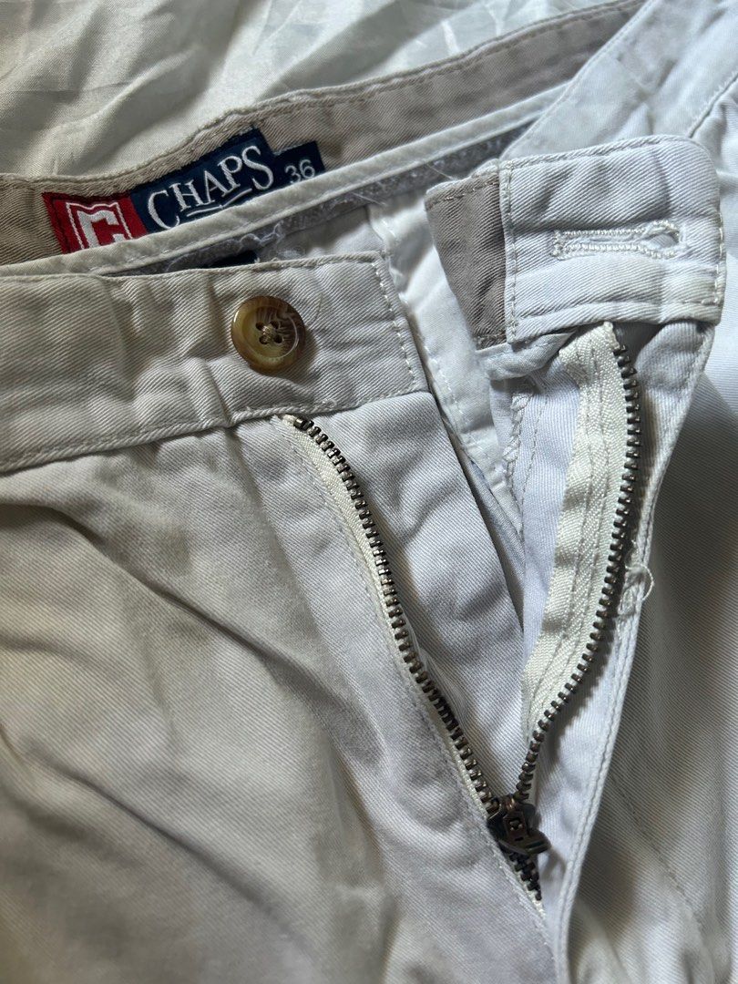 Chaps Classic Chino Shorts (Category: Shorts) located in Pasig City. Submitted by vintagestylemnl (Listing ID 1240456583, Image 2). Description: 📌Khaki Color 📌YKK zip 📌Zipper works well 📌2 pockets at the back 📌Tagged as size 36 but can fit up to 34 per tape measure.