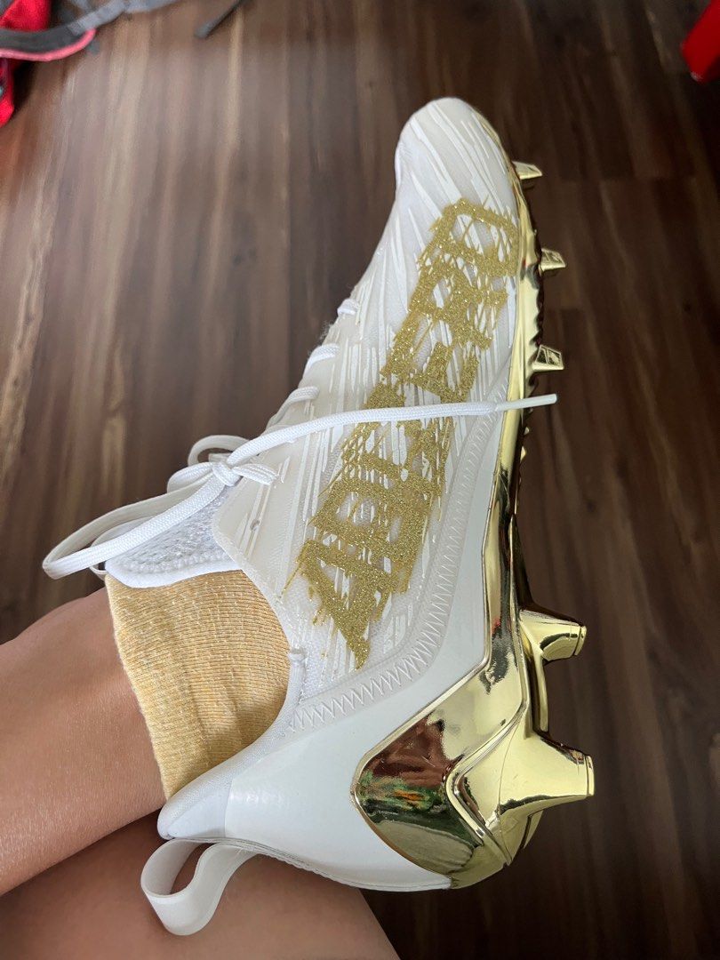 Gold and discount white football boots